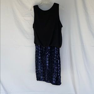 Sleeveless black top dress with blue sequin bottom